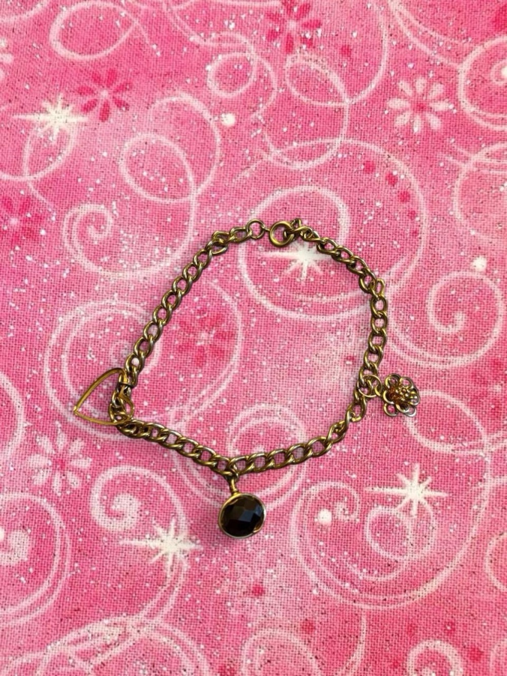 Gold-Tone Chain Bracelet with Black Gem and Flower Charm